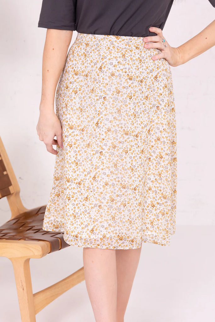 The Janey Midi Slip Skirt in Mustard Daisy