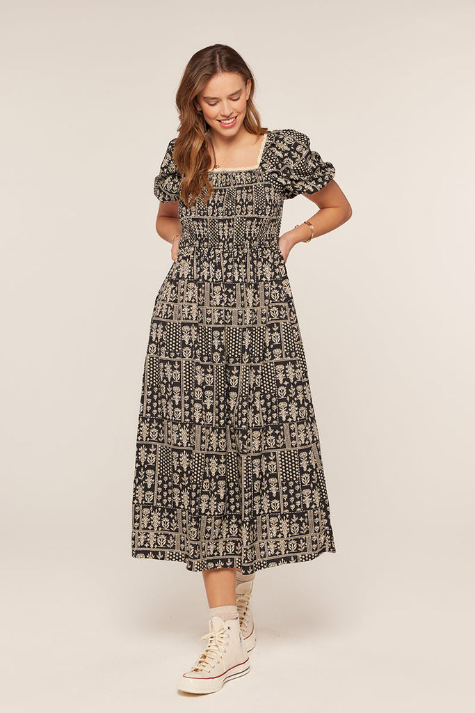 The Darlene Patch Printed Dress in Black/Ivory