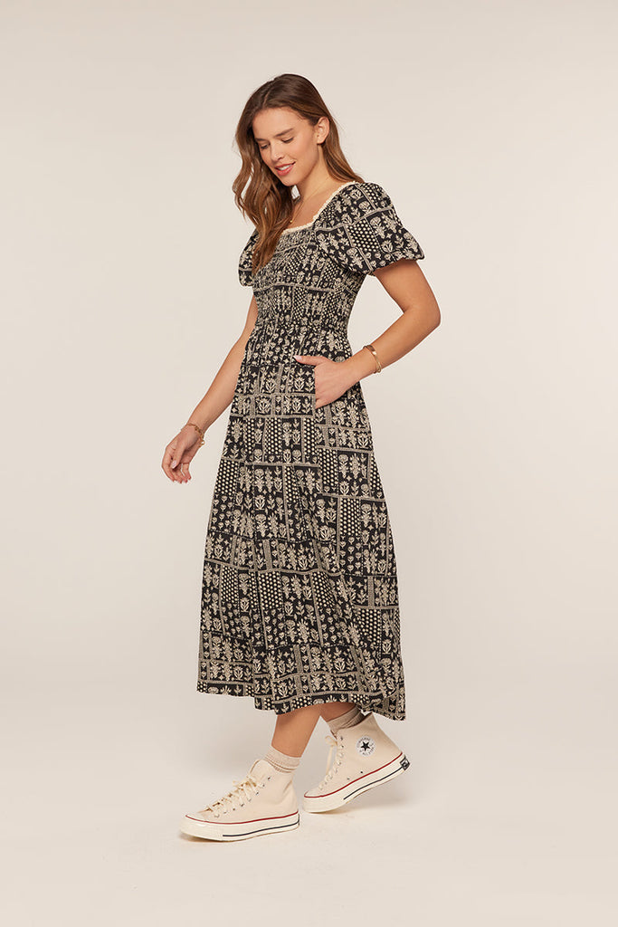 The Darlene Patch Printed Dress in Black/Ivory