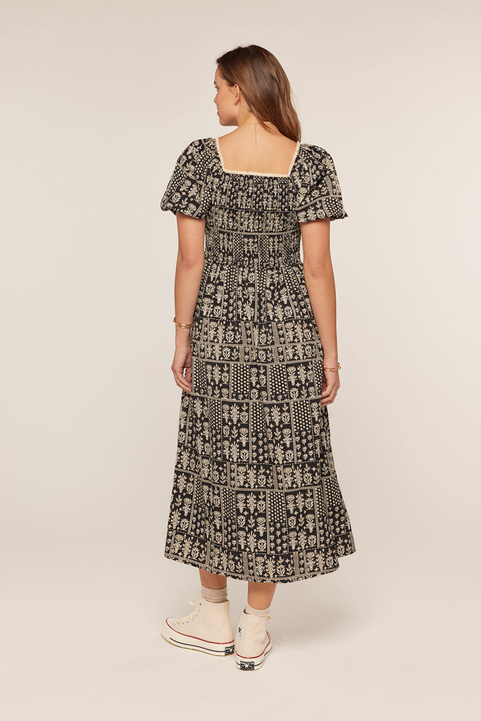 The Darlene Patch Printed Dress in Black/Ivory