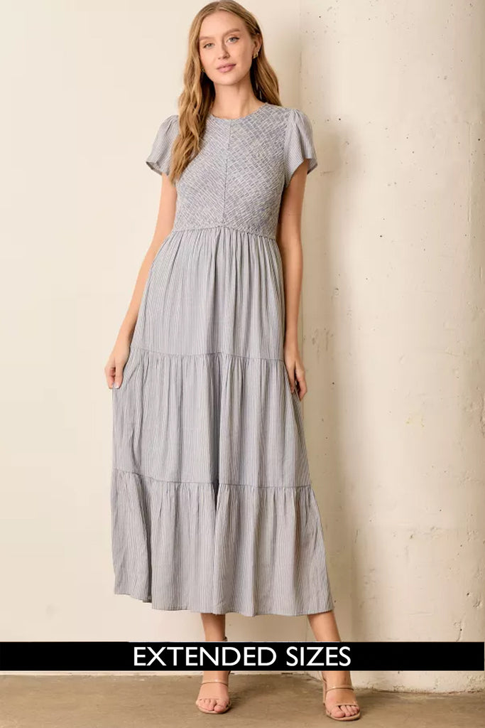 The Malia Smocked Tiered Maxi Dress in Blue