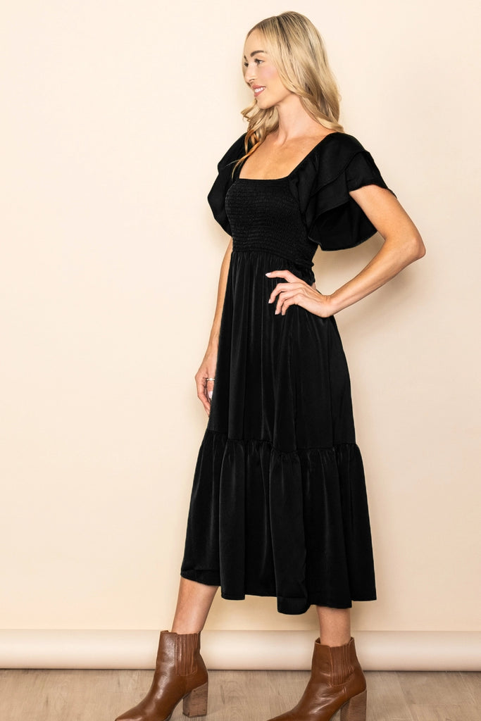 The Emmie Satin Flowy Smocked Dress in Black