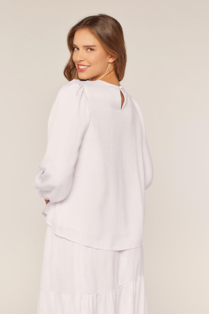 The Carli White Detailed Shoulder w/Ruffle Top Temple