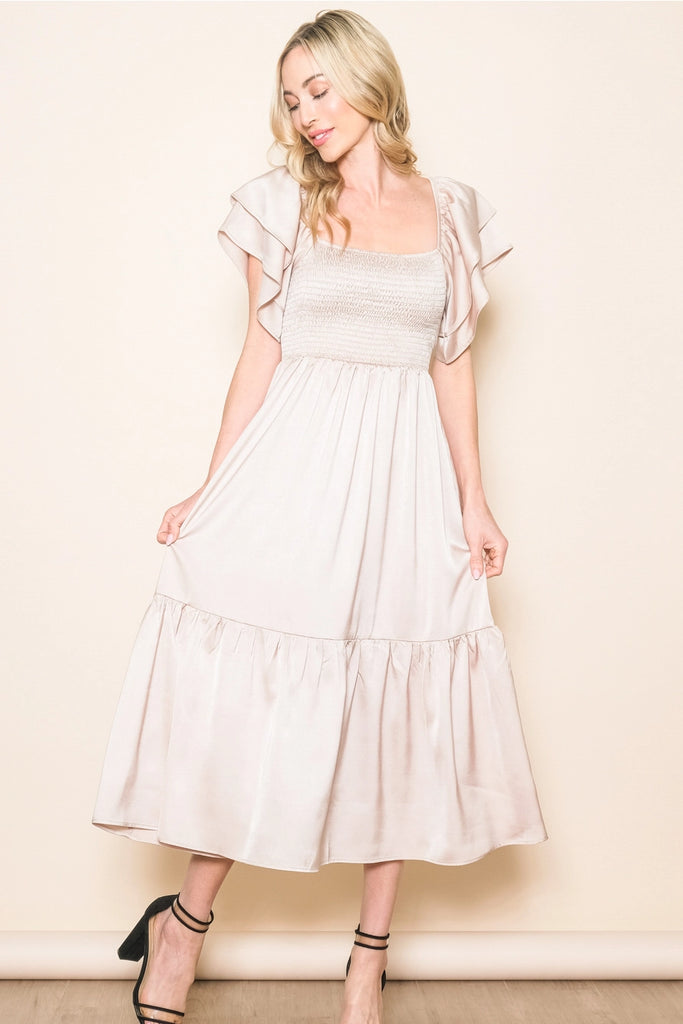 The Emmie Satin Flowy Smocked Dress in Champagne