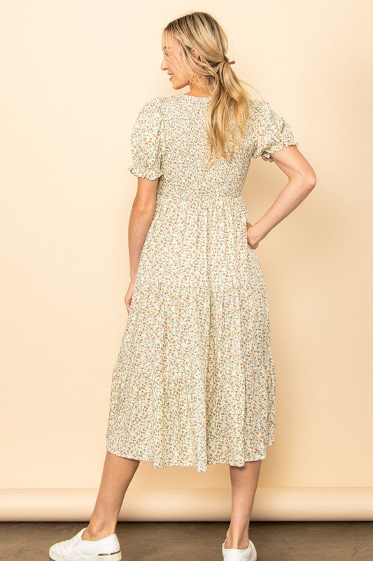 The Dana Tiny Floral Smocked Midi Dress in Vanilla