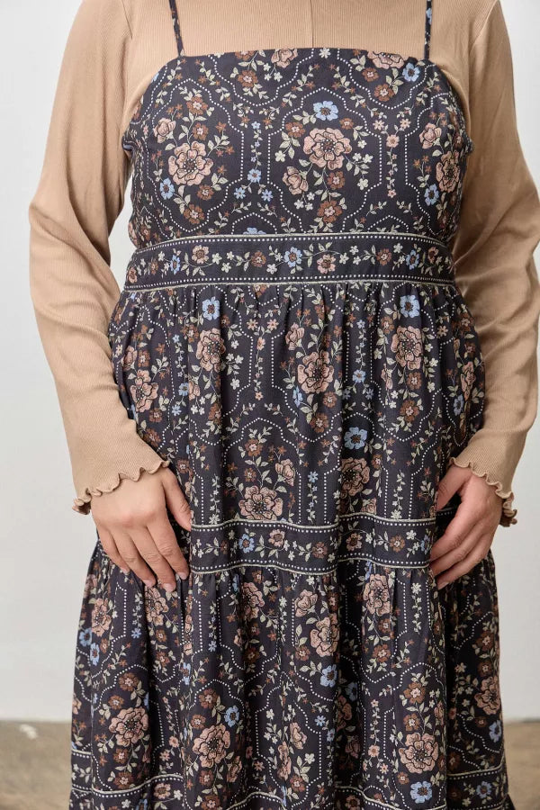 The Desirae Floral Sleeveless Midi Dress in Black Multi