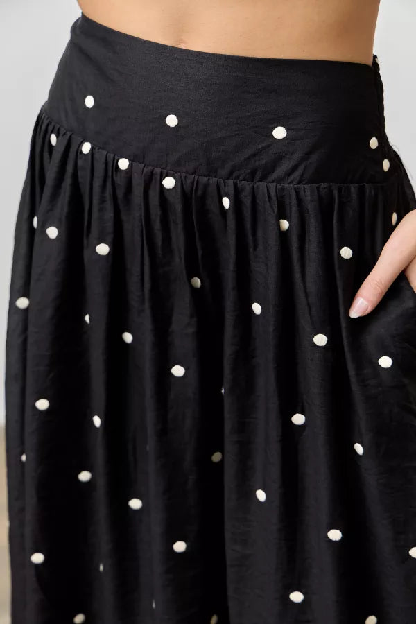 The Dakota Embroidered Dot Midi Skirt in Black