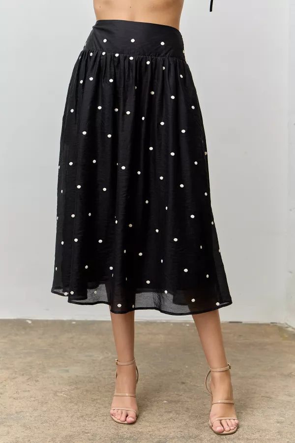 The Dakota Embroidered Dot Midi Skirt in Black
