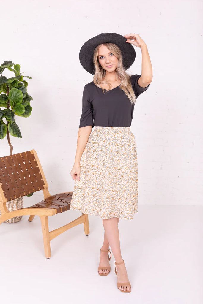 The Janey Midi Slip Skirt in Mustard Daisy