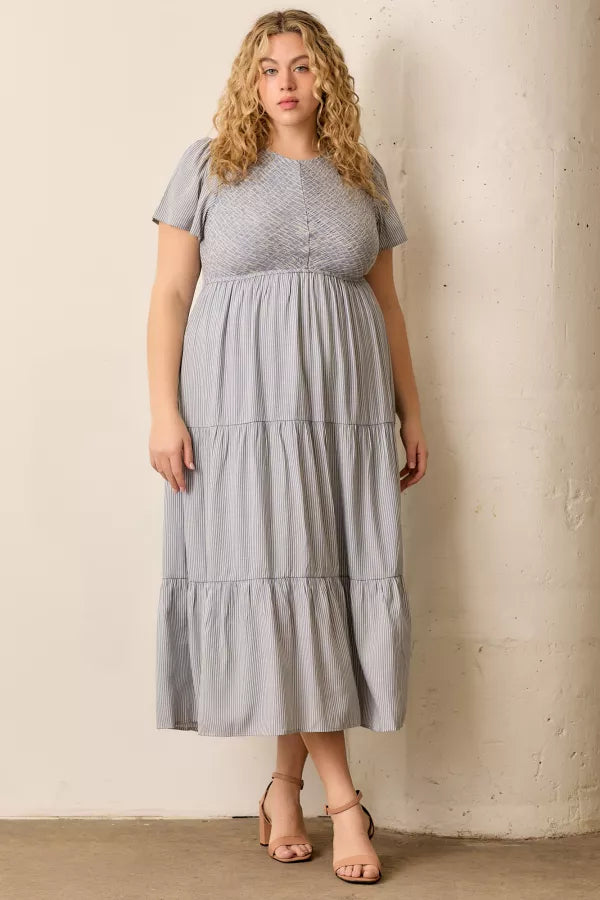 The Malia Smocked Tiered Maxi Dress in Blue